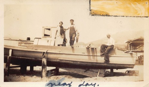 Man woman repairing boat - man,